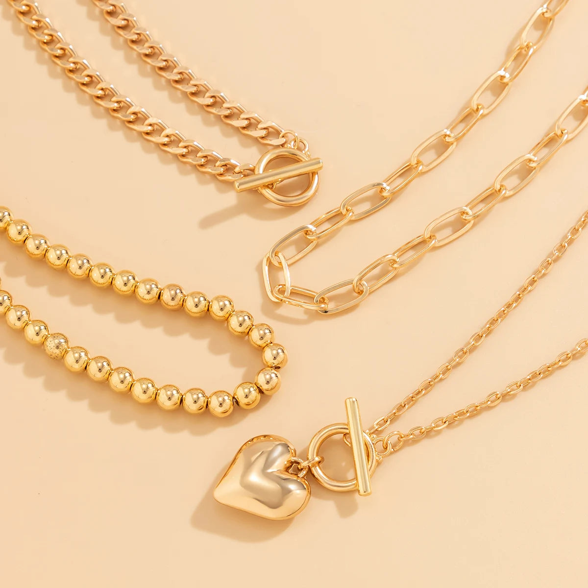 4Pcs Punk Gold Heart Pendant Necklace Set